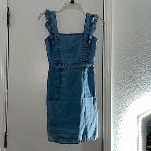 A cute denim dress. Only been worn once for pictures. In good condition.
